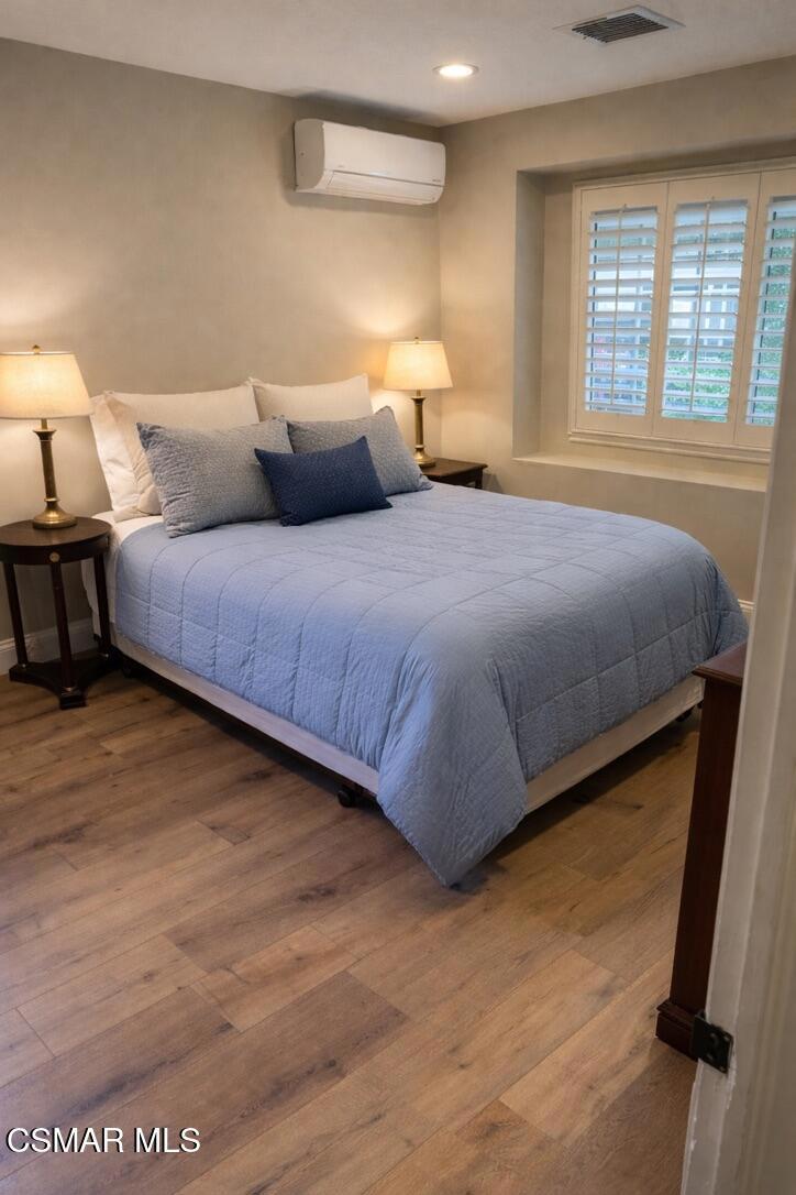 206 Rangely Court Simi Valley, CA 93065 - Photo 53 of 63 a bedroom with a bed and window