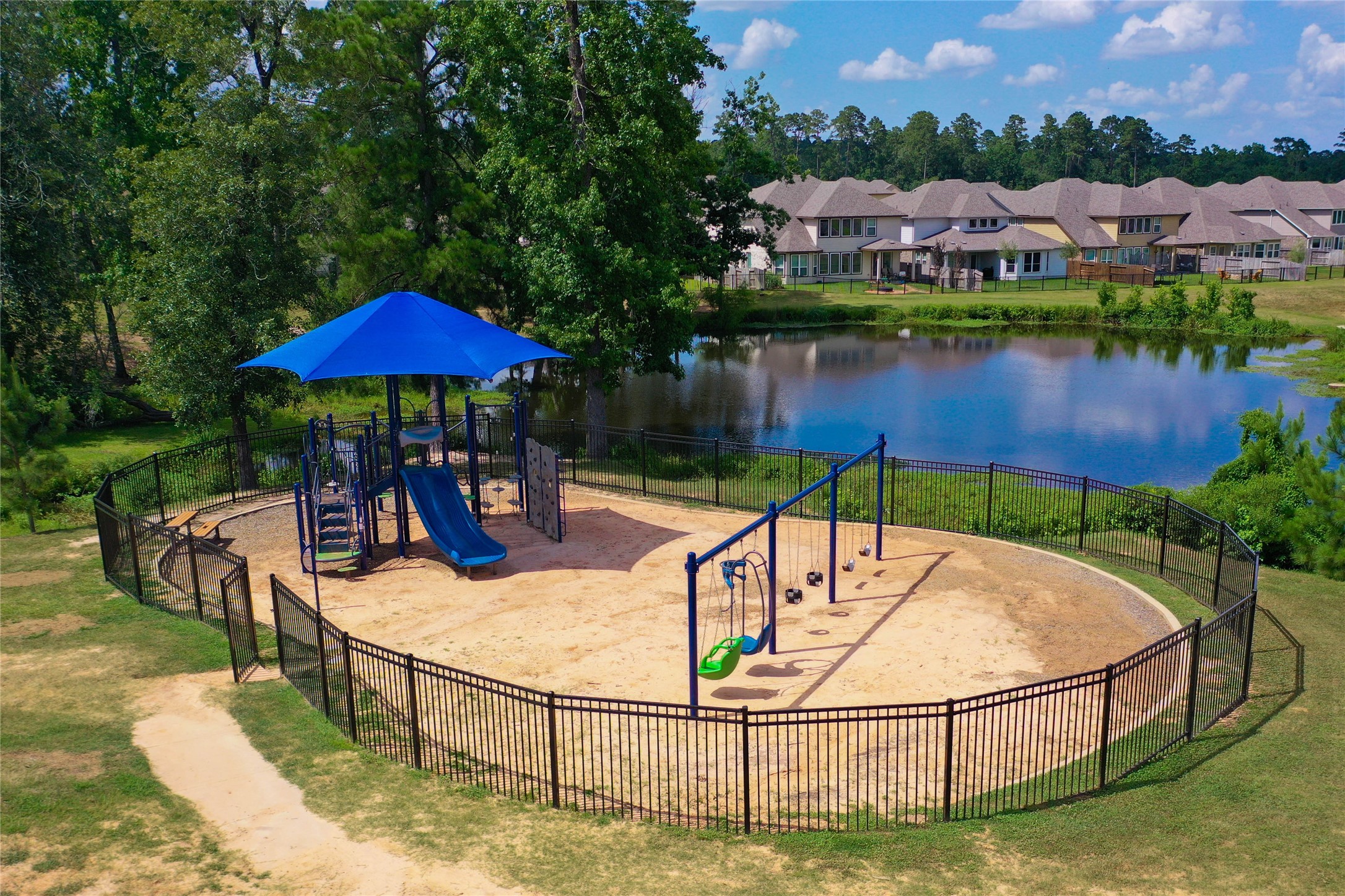 7080 Silverleaf Oak Street Conroe, TX 77304 - Photo 25 of 35 Swing and slide with the kiddos at the community playground!