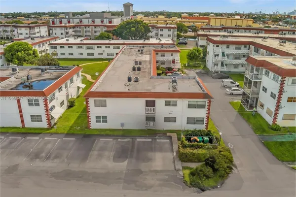 an aerial view of a building with outdoor space