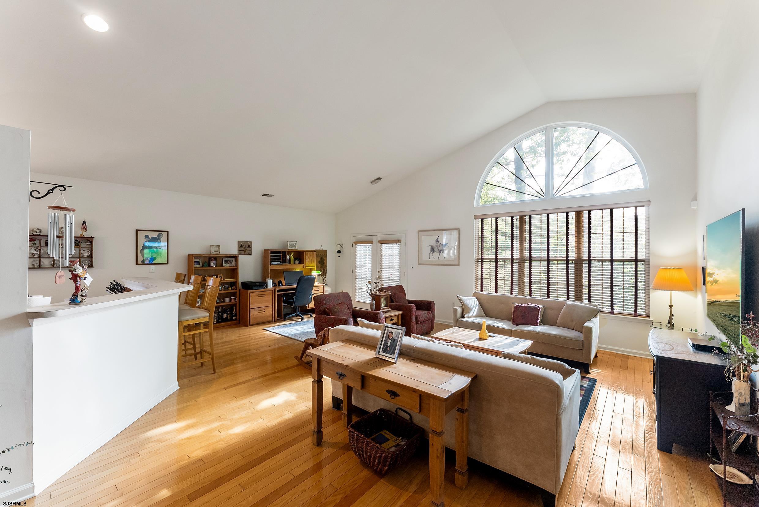 4 Northampton Road Smithville, NJ 08205 - Photo 15 of 39 a living room with furniture and a large window