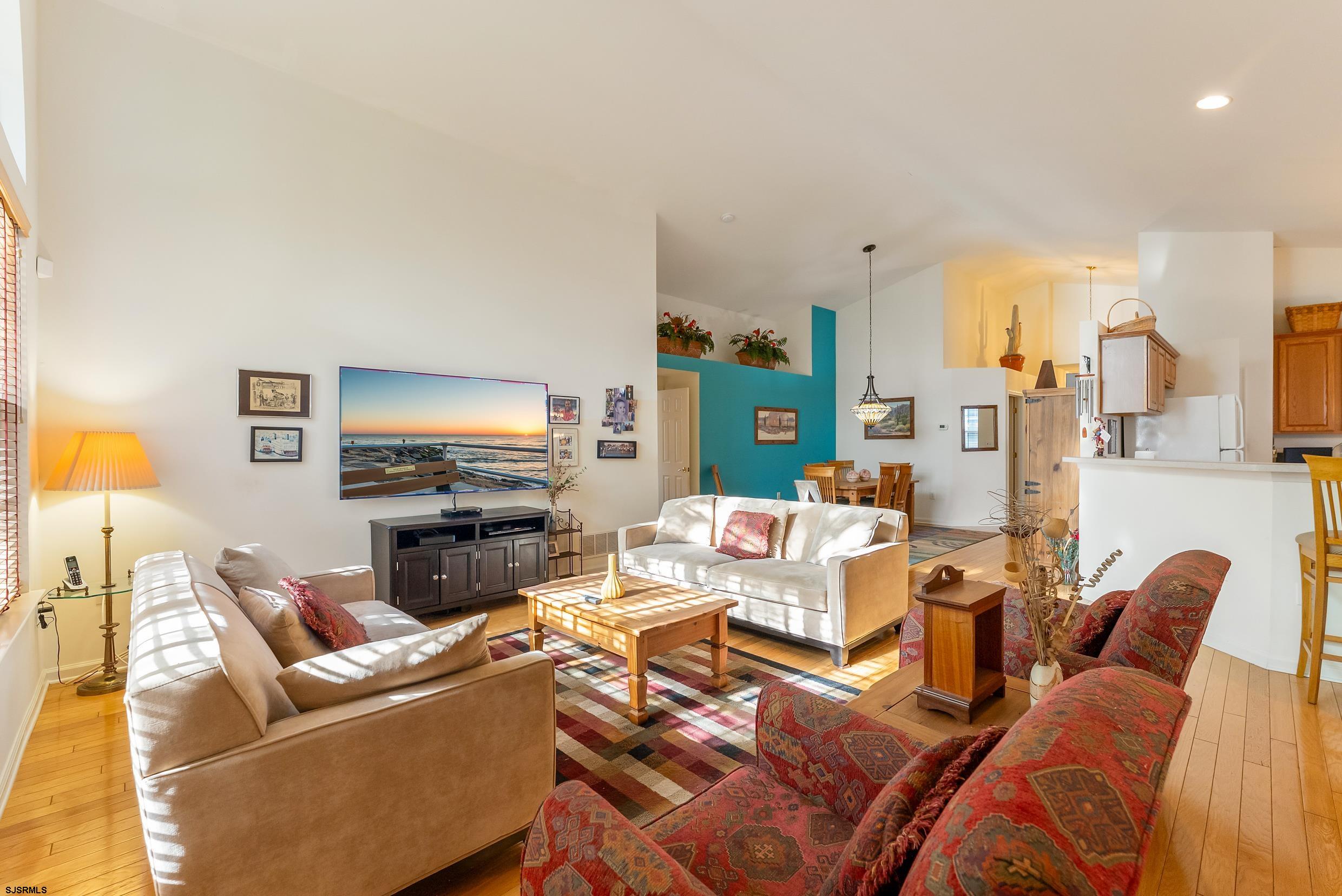 4 Northampton Road Smithville, NJ 08205 - Photo 10 of 39 a living room with furniture and a flat screen tv