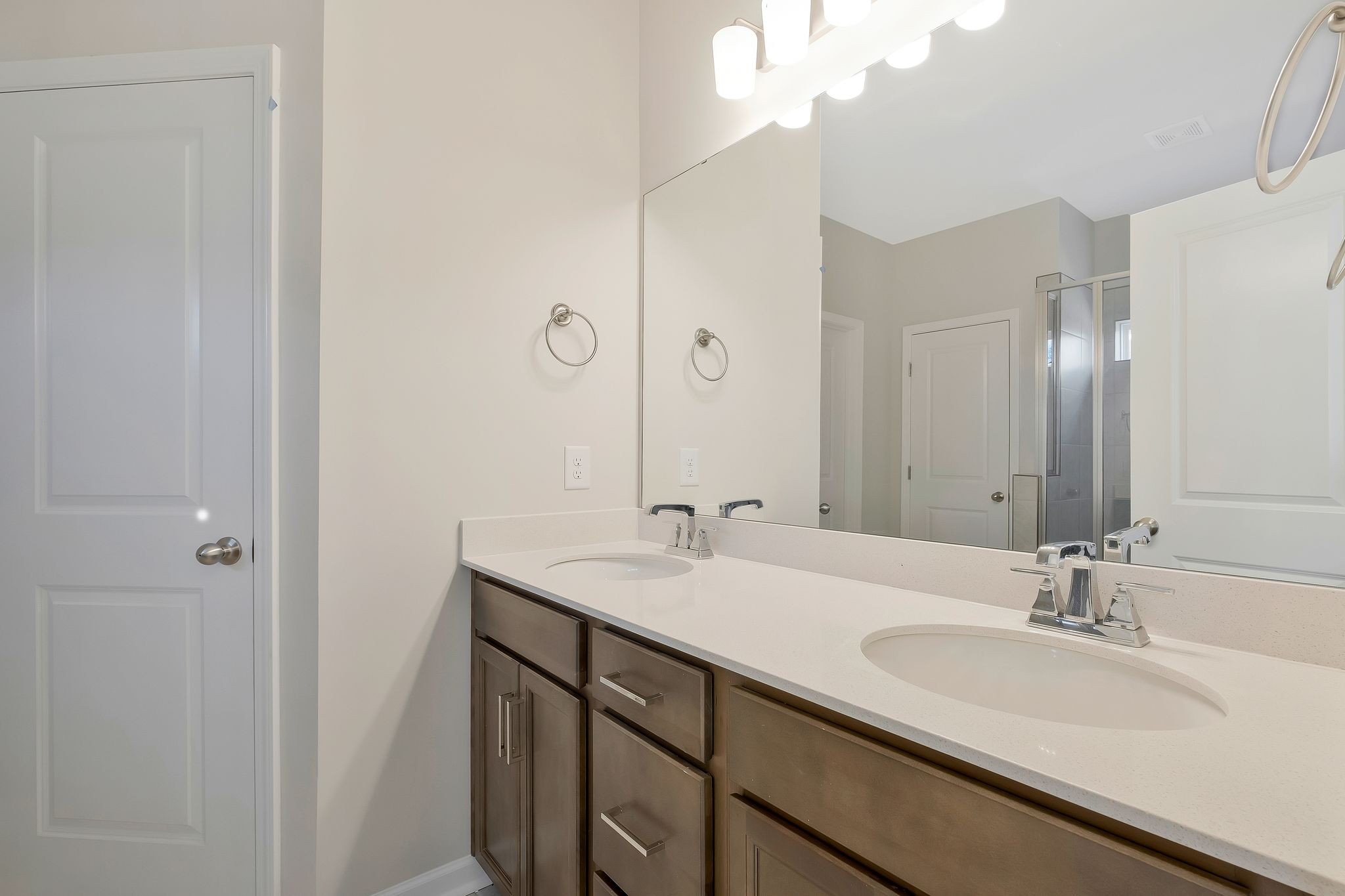 7321 Carothers Road Nolensville, TN 37135 - Photo 14 of 32 a bathroom with a sink double vanity and a mirror