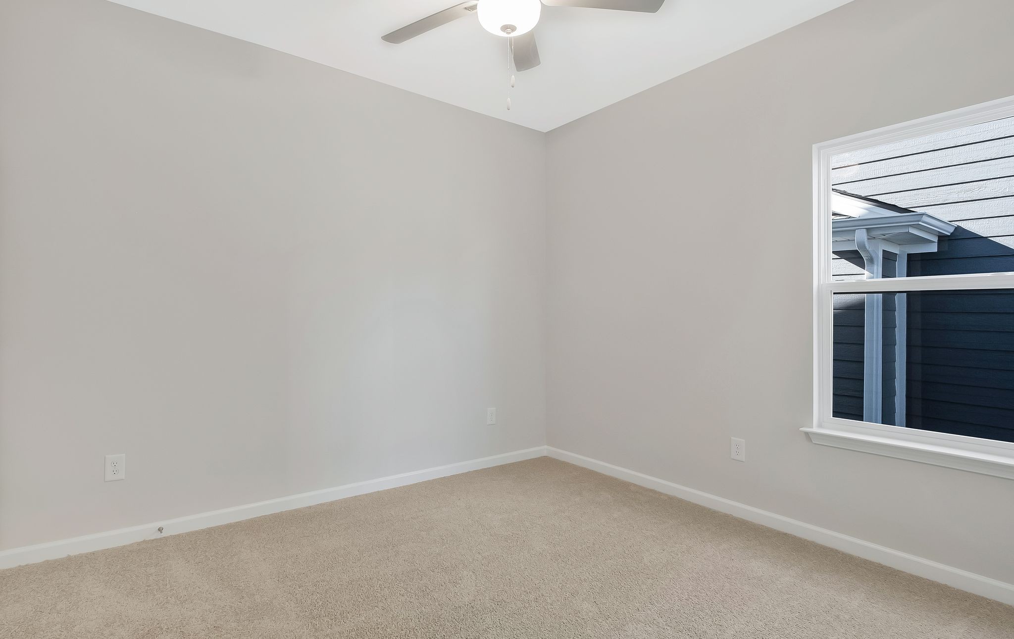 7321 Carothers Road Nolensville, TN 37135 - Photo 19 of 32 an empty room with a window and a kitchen view