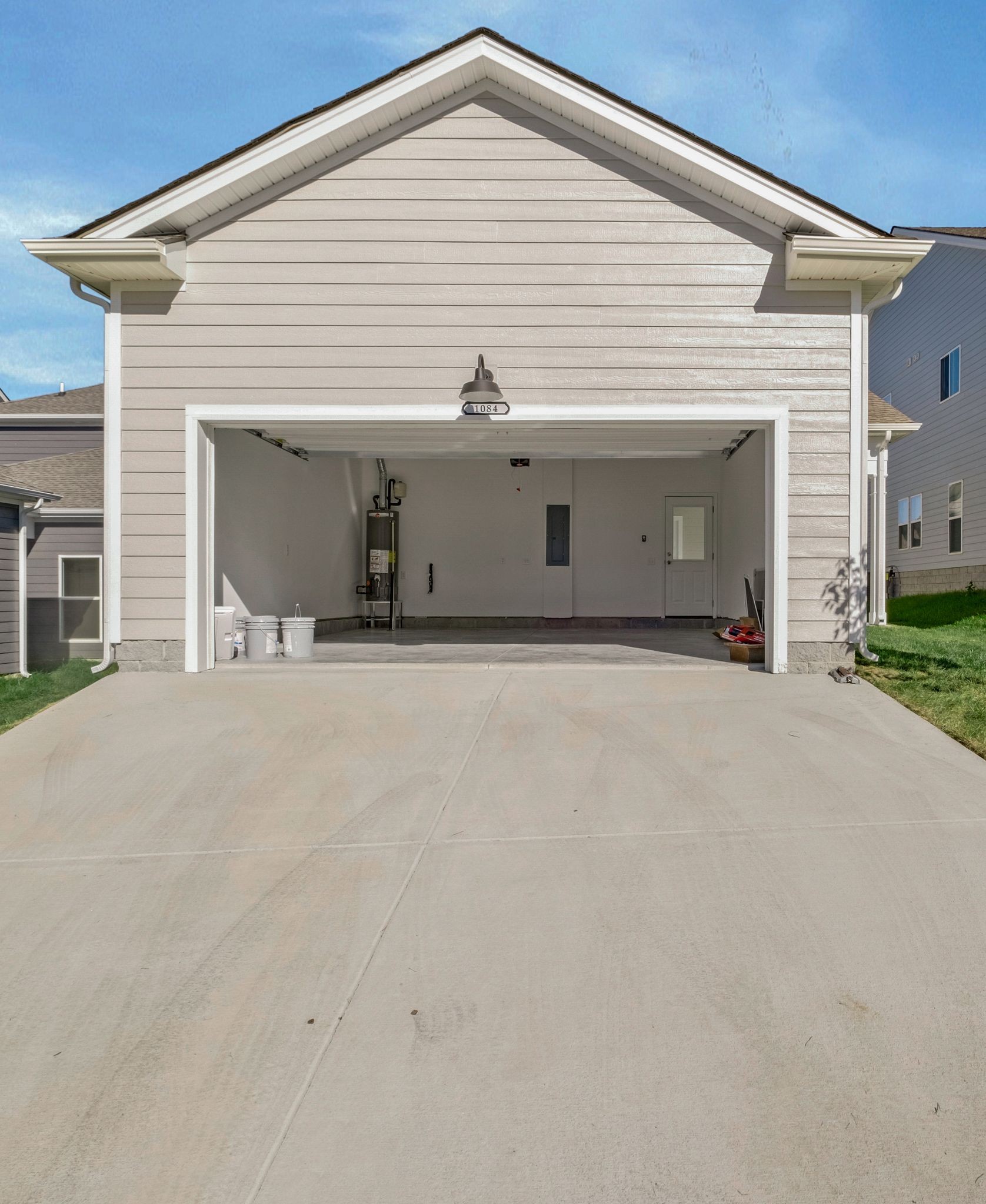 7321 Carothers Road Nolensville, TN 37135 - Photo 4 of 32 a front view of a house with garage