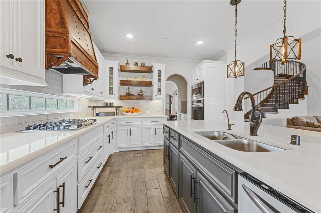 7720 Falcon Ridge Road Denton, TX 76208 - Photo 13 of 38 Sparkling stainless steel appliances