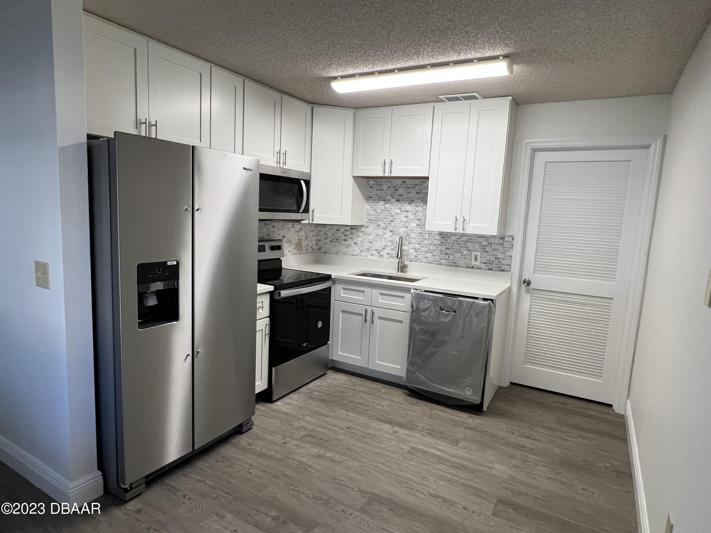 1601 Big Tree Road, Unit 403 South Daytona, FL 32119 - Photo 2 of 16 IMG_4495