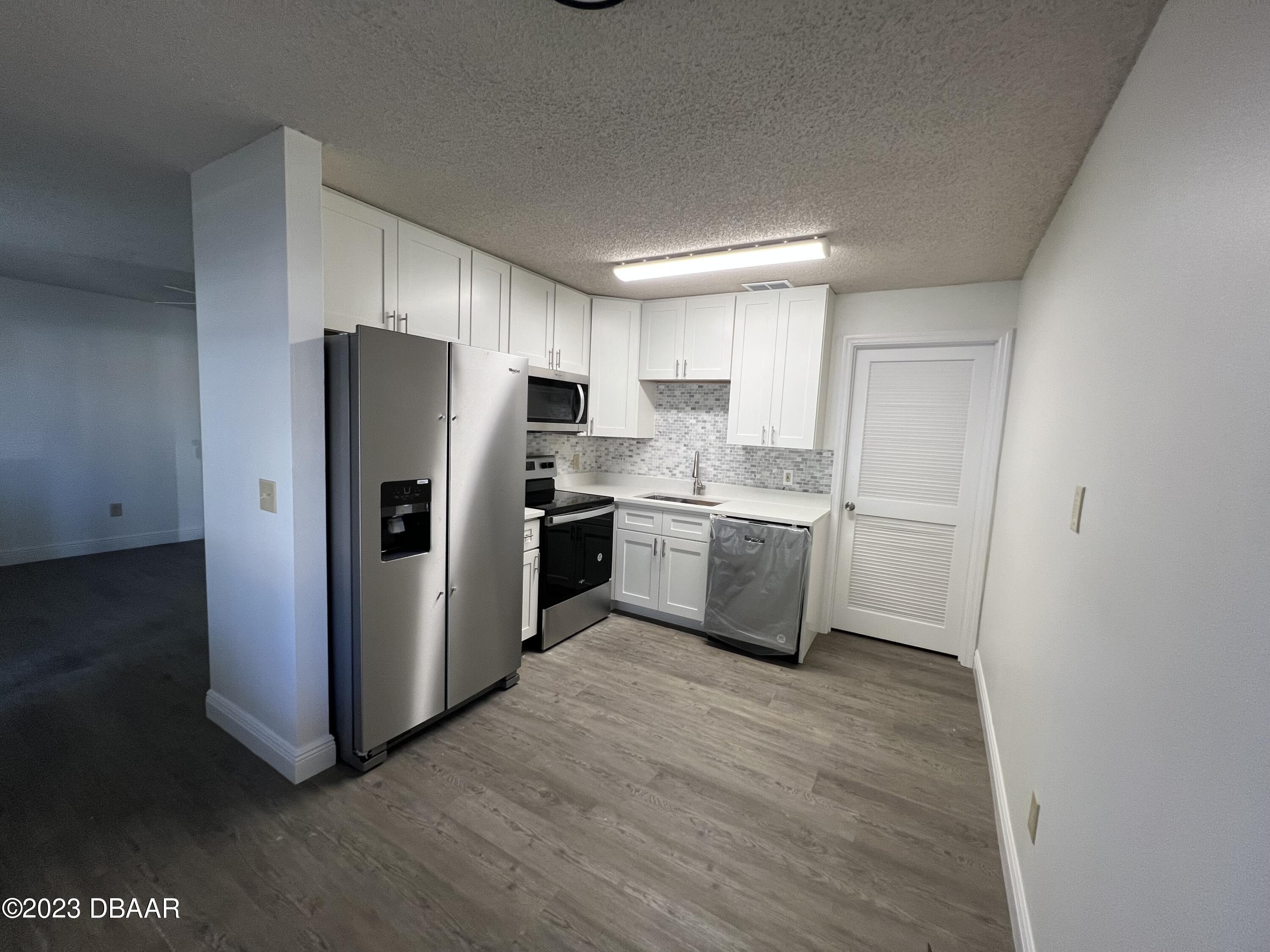 1601 Big Tree Road, Unit 403 South Daytona, FL 32119 - Photo 3 of 16 IMG_4497