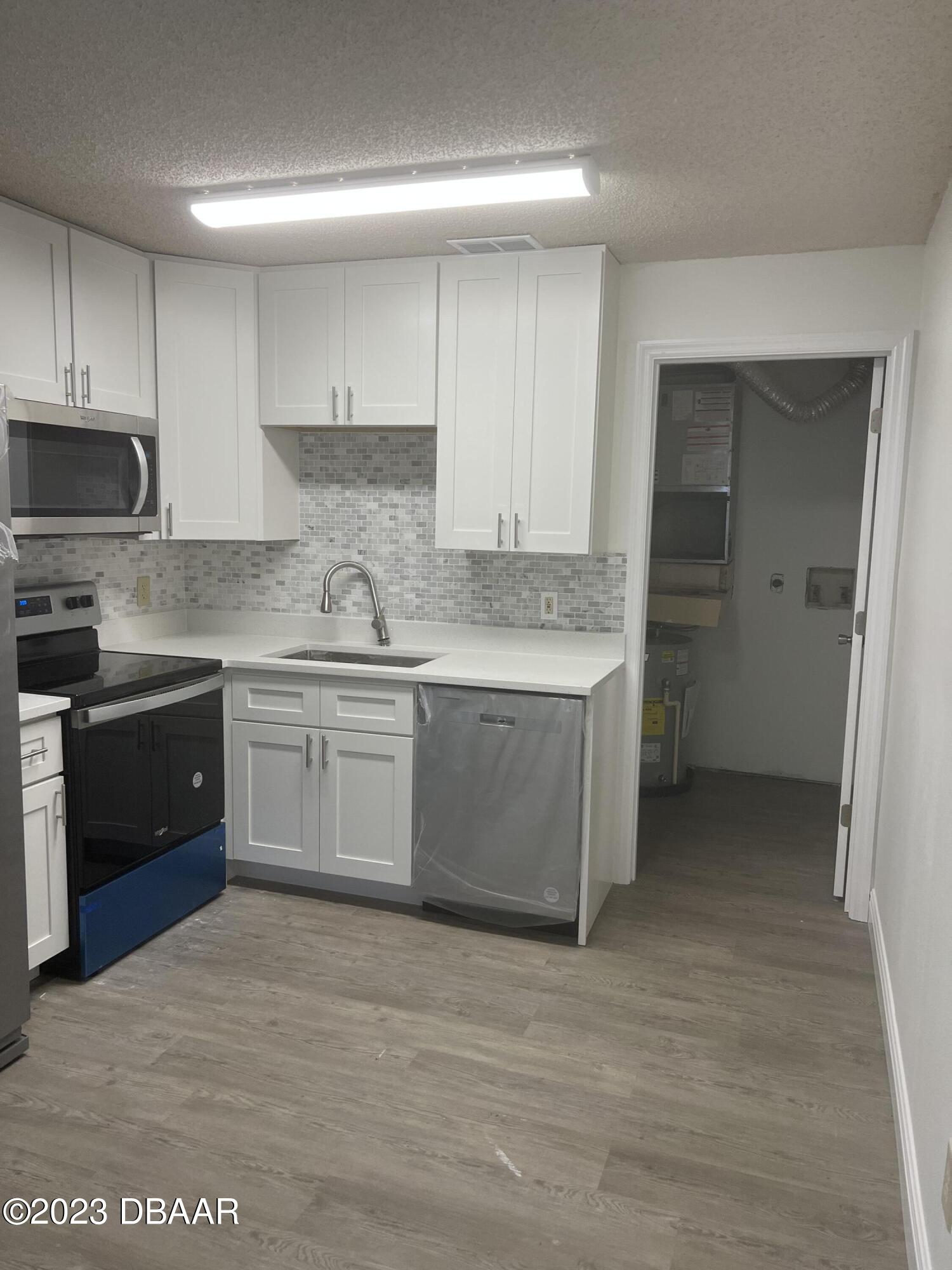 1601 Big Tree Road, Unit 403 South Daytona, FL 32119 - Photo 7 of 16 IMG-4404