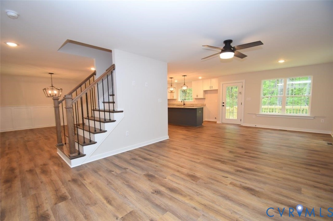 1749 Hollands Road Palmyra, VA 22963 - Photo 15 of 40 Unfurnished living room featuring a chandelier, re