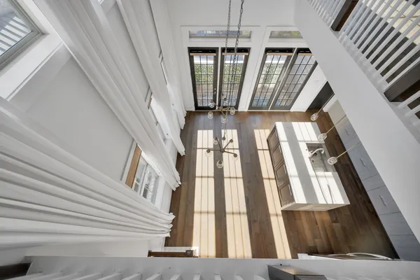 a view of staircase with large window