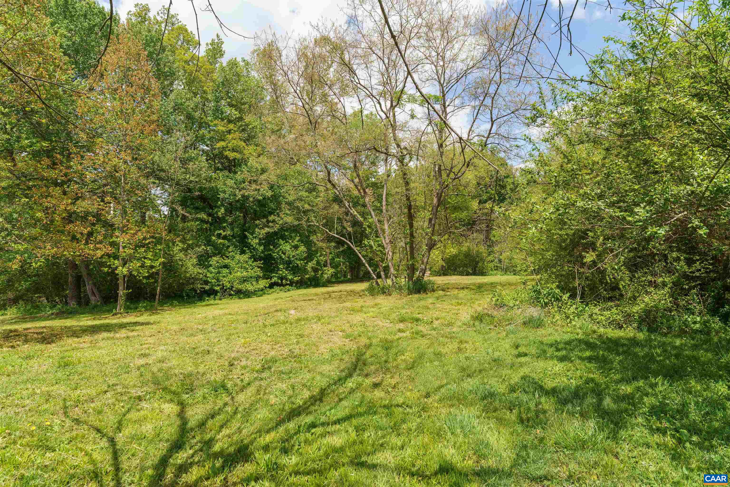 418 James River Road Scottsville, VA 24590 - Photo 49 of 61 a view of a yard with a trees