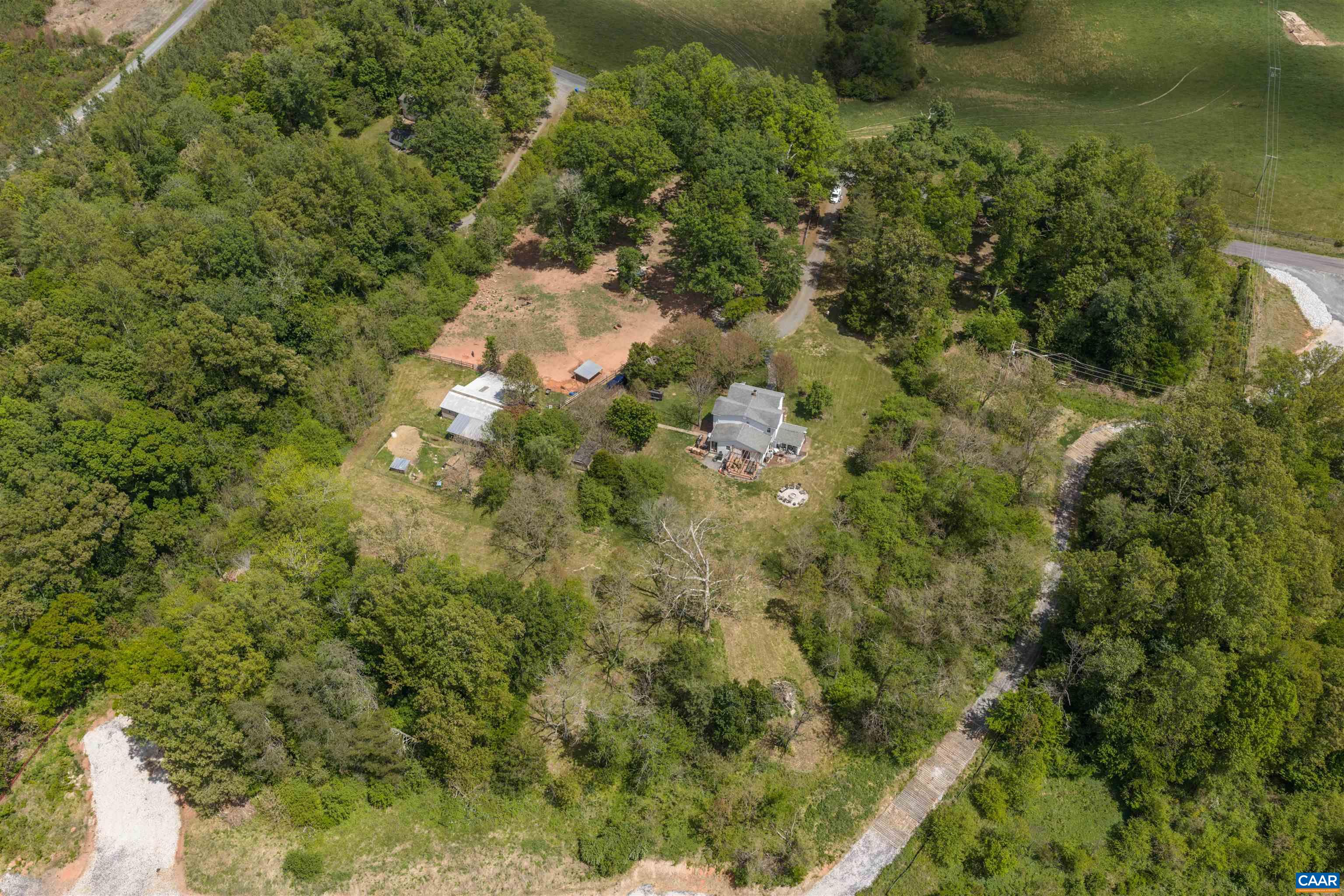 418 James River Road Scottsville, VA 24590 - Photo 60 of 61 a view of a forest with a houses