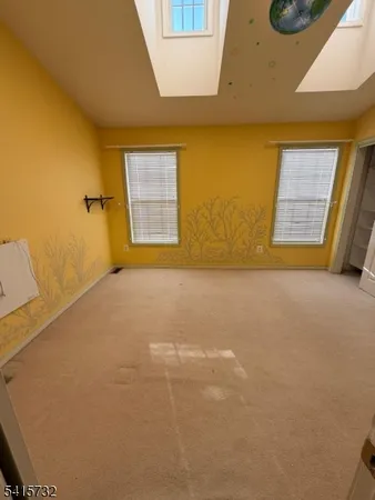 a view of a room with a window