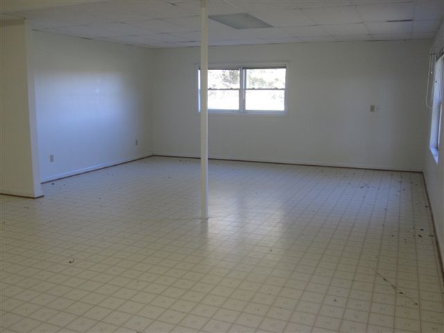 3778 Callaway Road Rocky Mount, VA 24151 - Photo 16 of 28 an empty room with wooden floor and windows