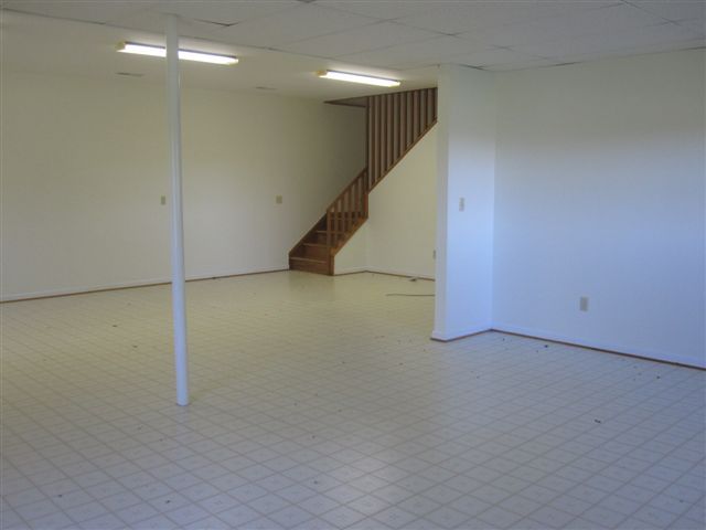 3778 Callaway Road Rocky Mount, VA 24151 - Photo 18 of 28 a view of a room with stairs and white walls