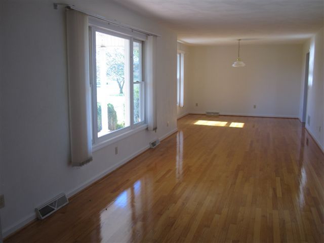 3778 Callaway Road Rocky Mount, VA 24151 - Photo 3 of 28 a view of empty room with wooden floor and fan