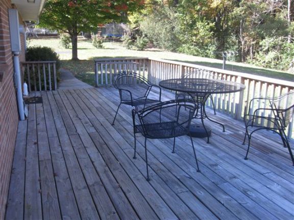 3778 Callaway Road Rocky Mount, VA 24151 - Photo 23 of 28 a view of a wooden deck with furniture