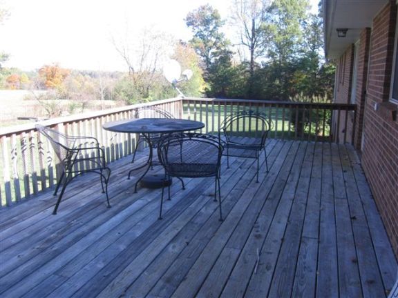 3778 Callaway Road Rocky Mount, VA 24151 - Photo 24 of 28 a view of a wooden deck with furniture