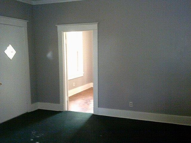 3172 Hoskins Road Memphis, TN 38111 - Photo 8 of 15 Empty room featuring baseboards and dark wood-type flooring