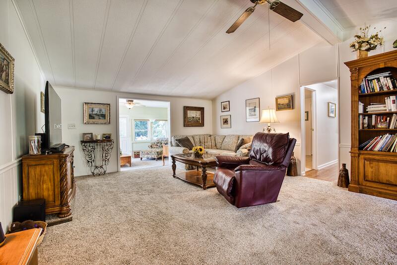 1199 Brammer Spur Road Woolwine, VA 24185 - Photo 13 of 36 a living room with furniture and a flat screen tv