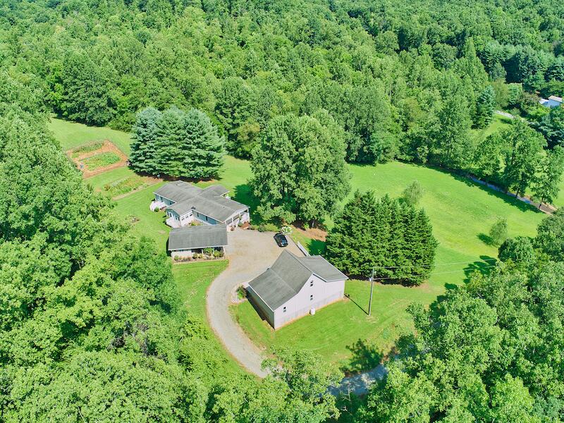 1199 Brammer Spur Road Woolwine, VA 24185 - Photo 6 of 36 an aerial view of residential house with outdoor space and trees all around