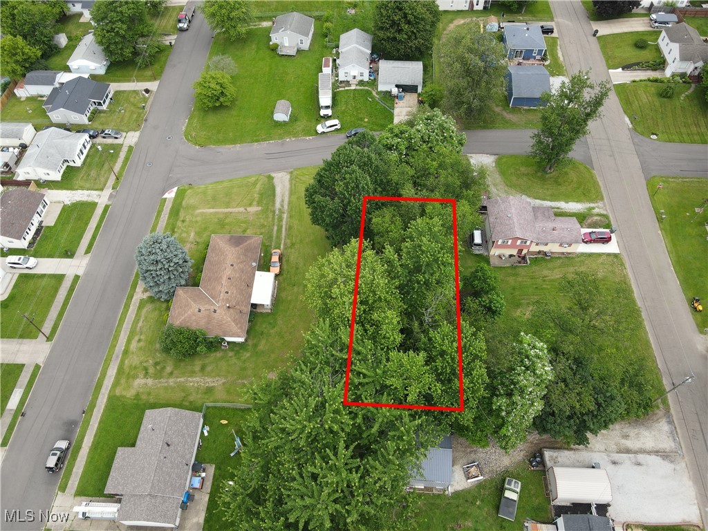 20th Street Southwest Canton, OH 44706 - Photo 3 of 4 Aerial perspective of suburban area with property boundaries highlighted