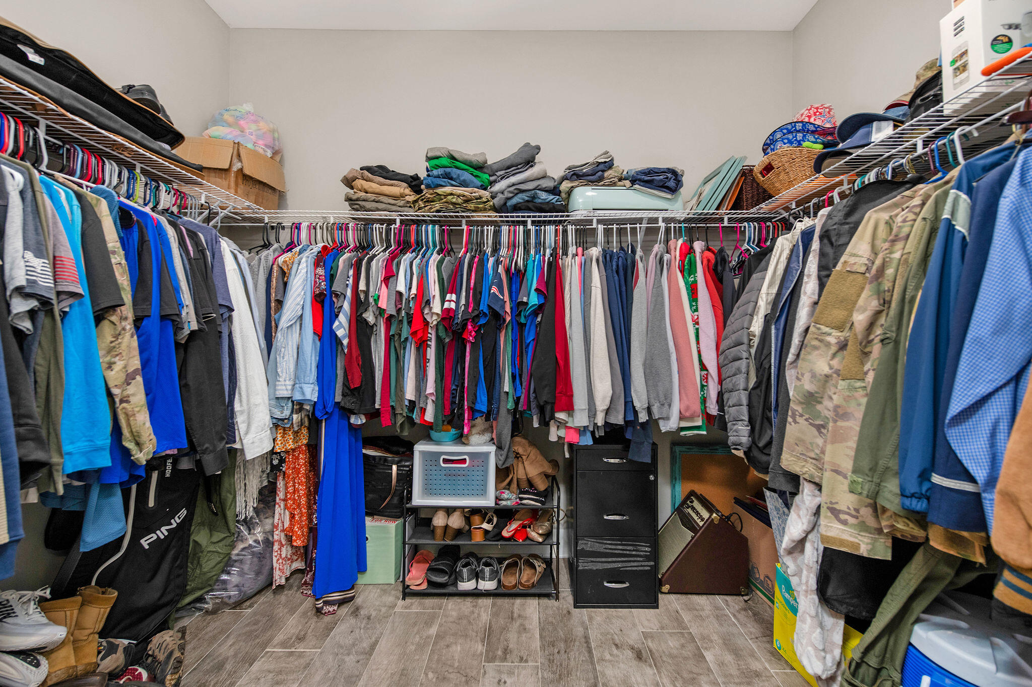 8914 Timber Lane Navarre, FL 32566 - Photo 25 of 40 a view of walk in closet with clothes