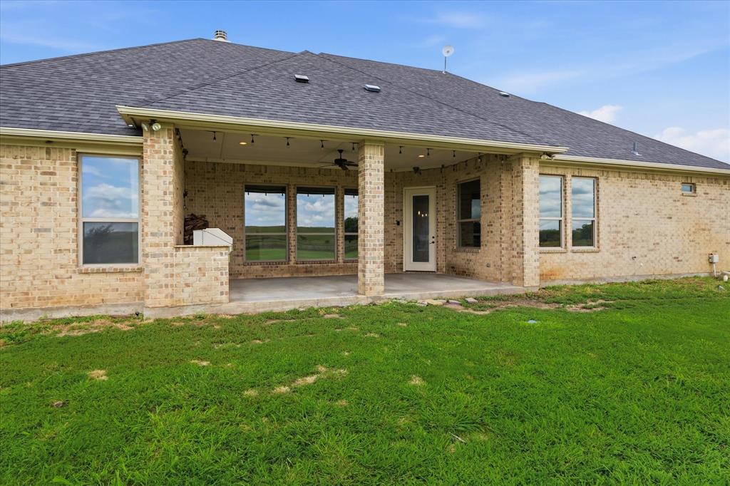 160 Vista Ridge North Decatur, TX 76234 - Photo 34 of 40 a view of a house with a garden
