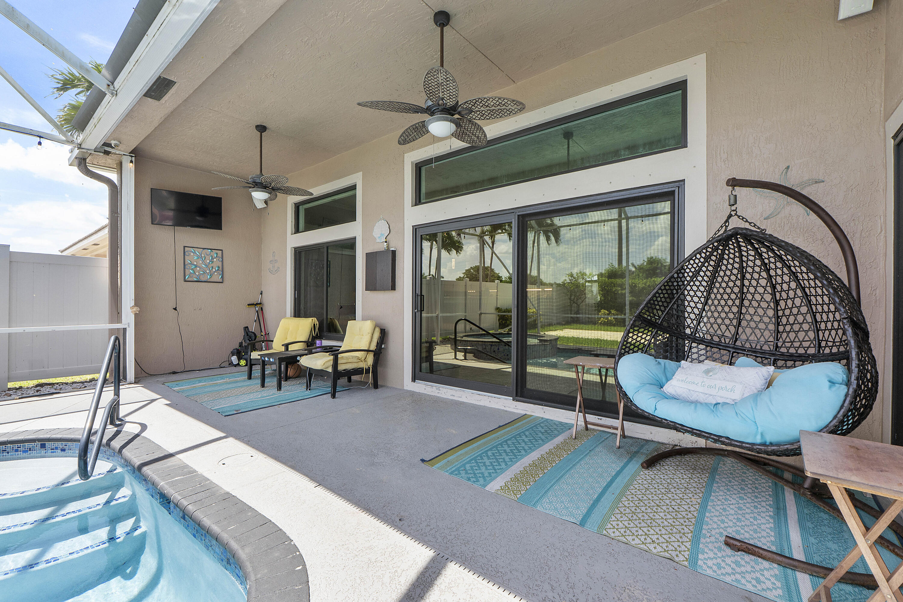12328 St Simon Drive Boca Raton, FL 33428 - Photo 35 of 52 a living room with furniture and a window