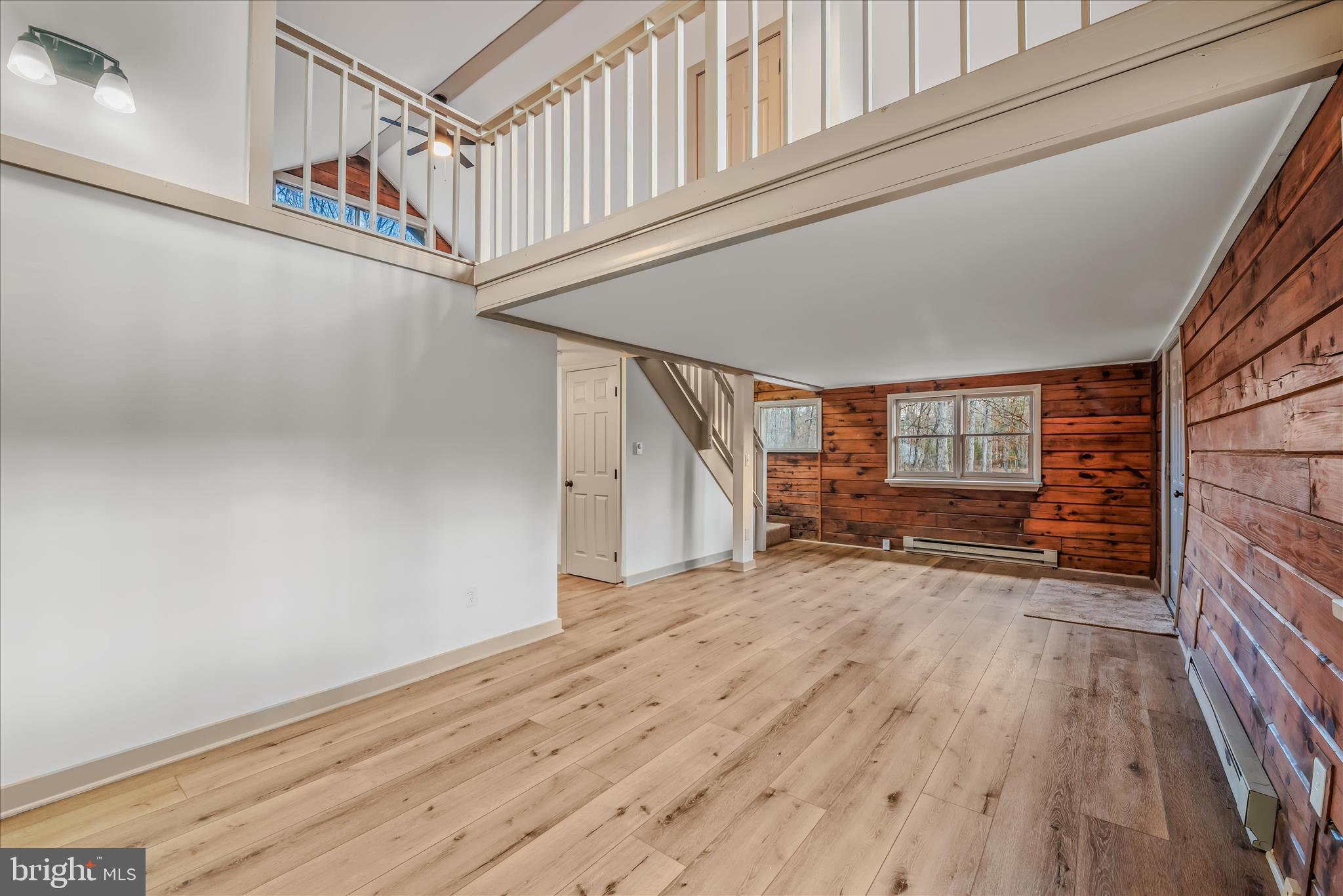 495 Getaway Road Hedgesville, WV 25427 - Photo 13 of 44 a view of an entryway with wooden floor