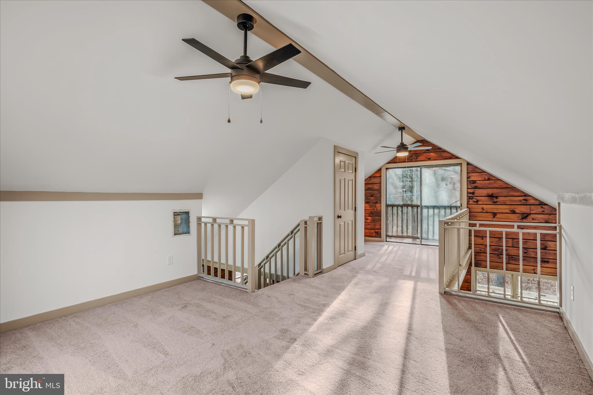 495 Getaway Road Hedgesville, WV 25427 - Photo 24 of 44 a view of a hallway with staircase