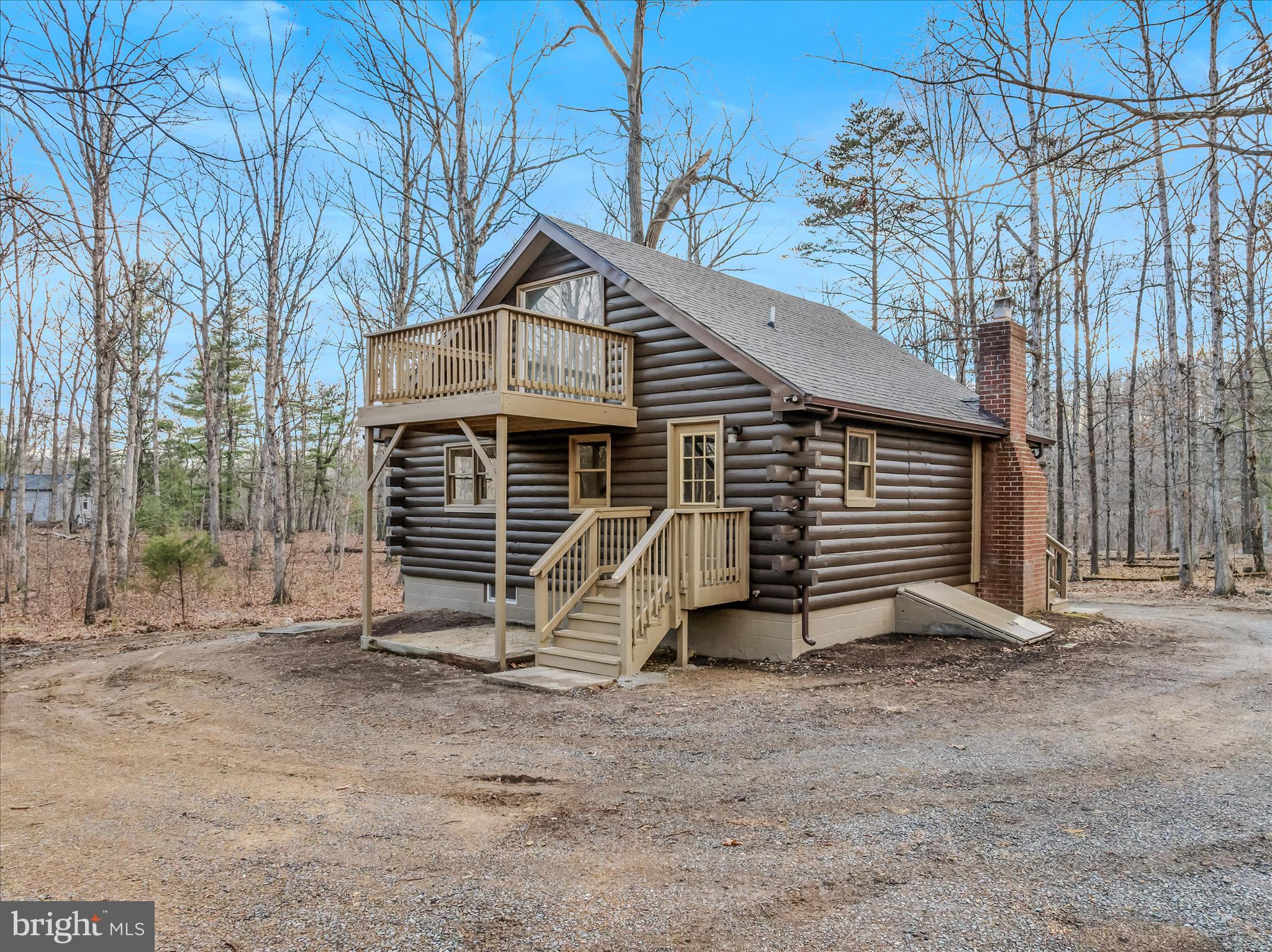 495 Getaway Road Hedgesville, WV 25427 - Photo 5 of 44 a view of house with a yard