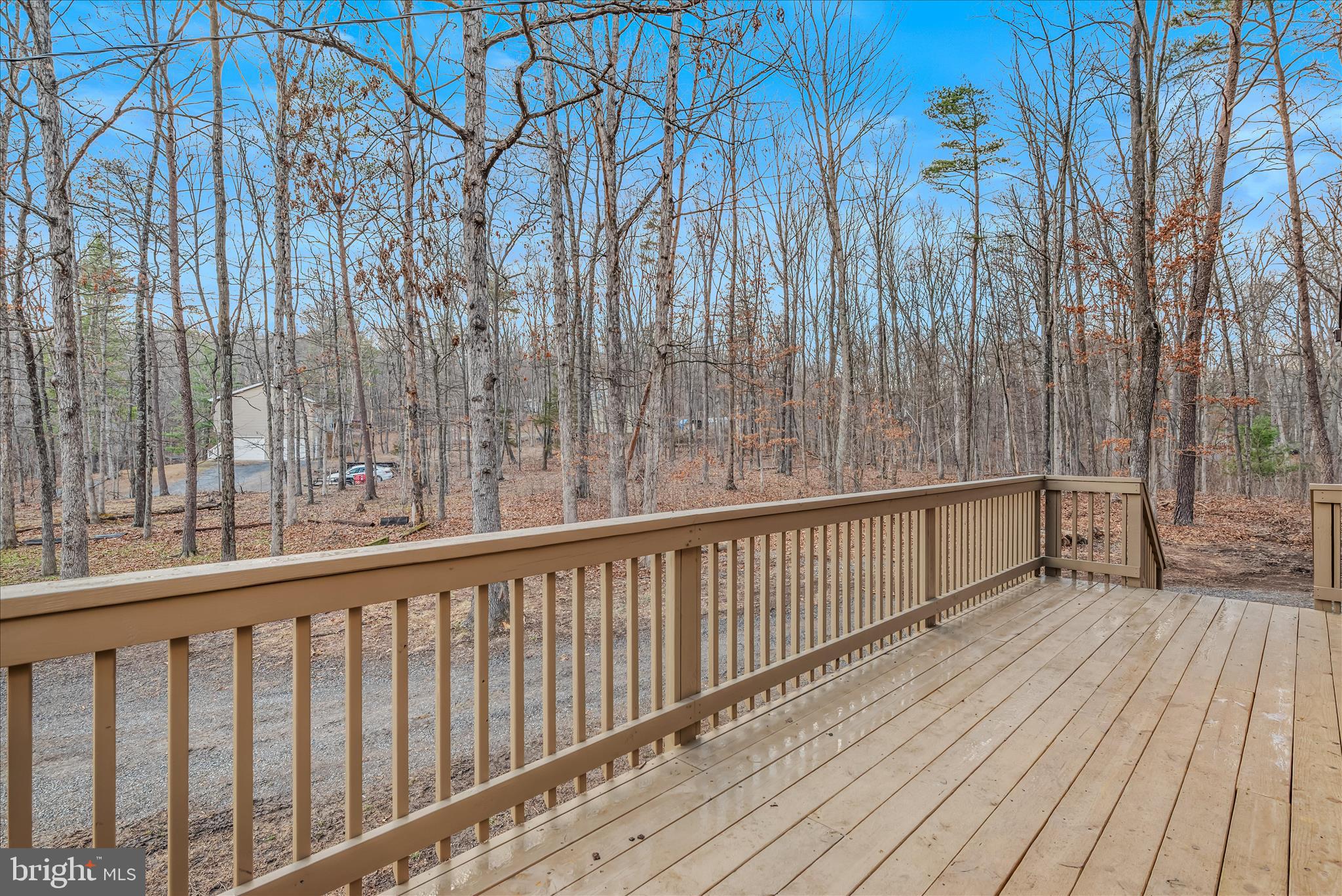 495 Getaway Road Hedgesville, WV 25427 - Photo 9 of 44 a view of balcony with wooden floor and fence