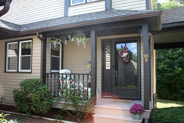 23 Highfield Road, Unit D Charlton, MA 01507 - Photo 1 of 24 a front view of a house with a porch