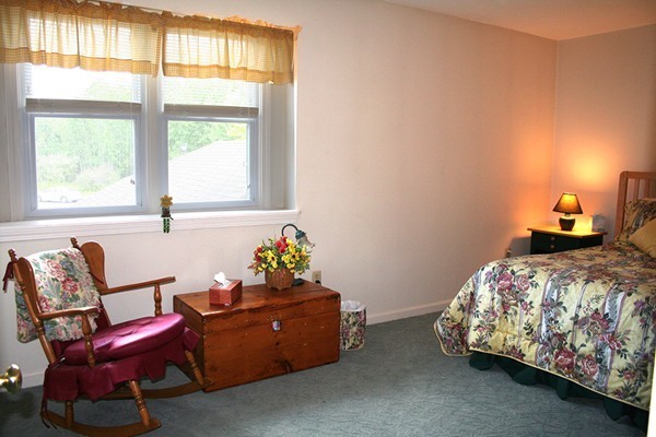 23 Highfield Road, Unit D Charlton, MA 01507 - Photo 19 of 24 a bedroom with bed chair and window