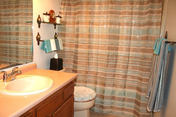 23 Highfield Road, Unit D Charlton, MA 01507 - Photo 21 of 24 a bathroom with a sink toilet and shower