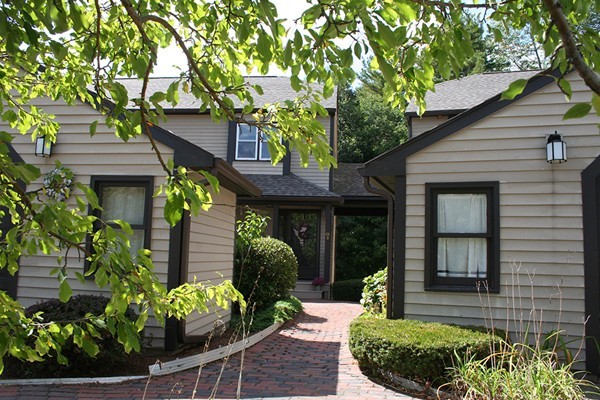 23 Highfield Road, Unit D Charlton, MA 01507 - Photo 22 of 24 a front view of a house with garden