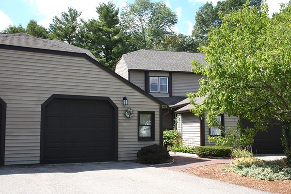 23 Highfield Road, Unit D Charlton, MA 01507 - Photo 23 of 24 a front view of a house with a yard