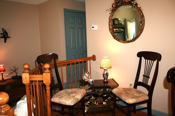 23 Highfield Road, Unit D Charlton, MA 01507 - Photo 5 of 24 a view of a chairs in balcony