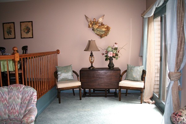 23 Highfield Road, Unit D Charlton, MA 01507 - Photo 8 of 24 a living room with furniture and a window