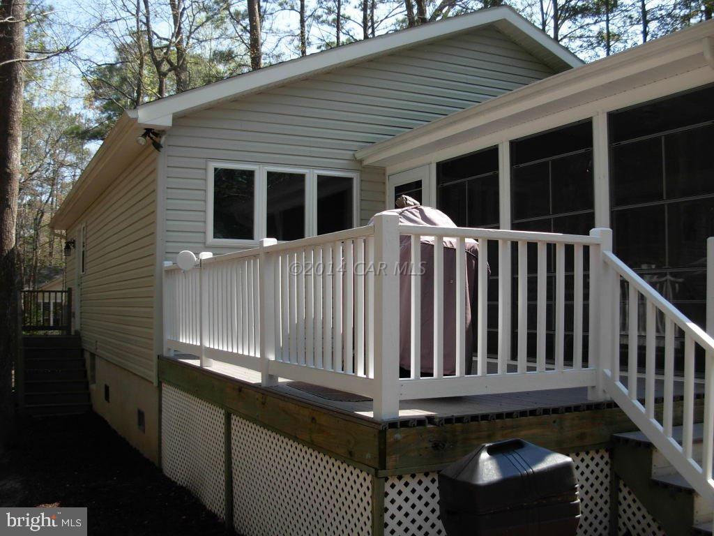 34 Rabbit Run Lane Ocean Pines, MD 21811 - Photo 3 of 20 a view of a back yard of the house