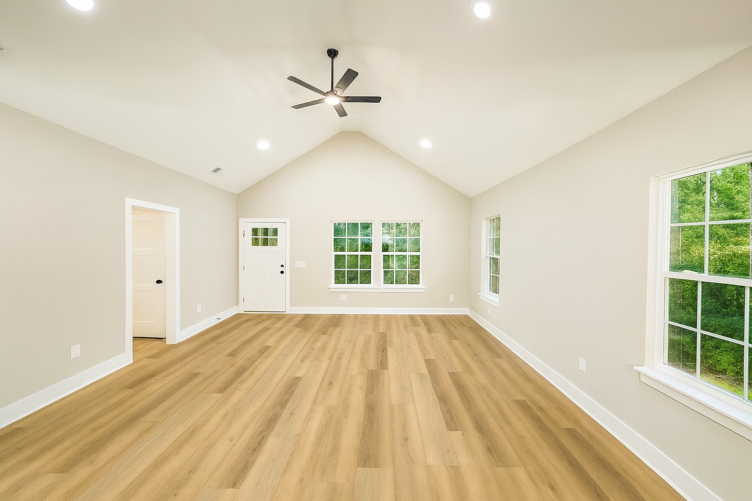 810 Lucas Road Dickson, TN 37055 - Photo 12 of 37 a view of empty room with wooden floor and fan