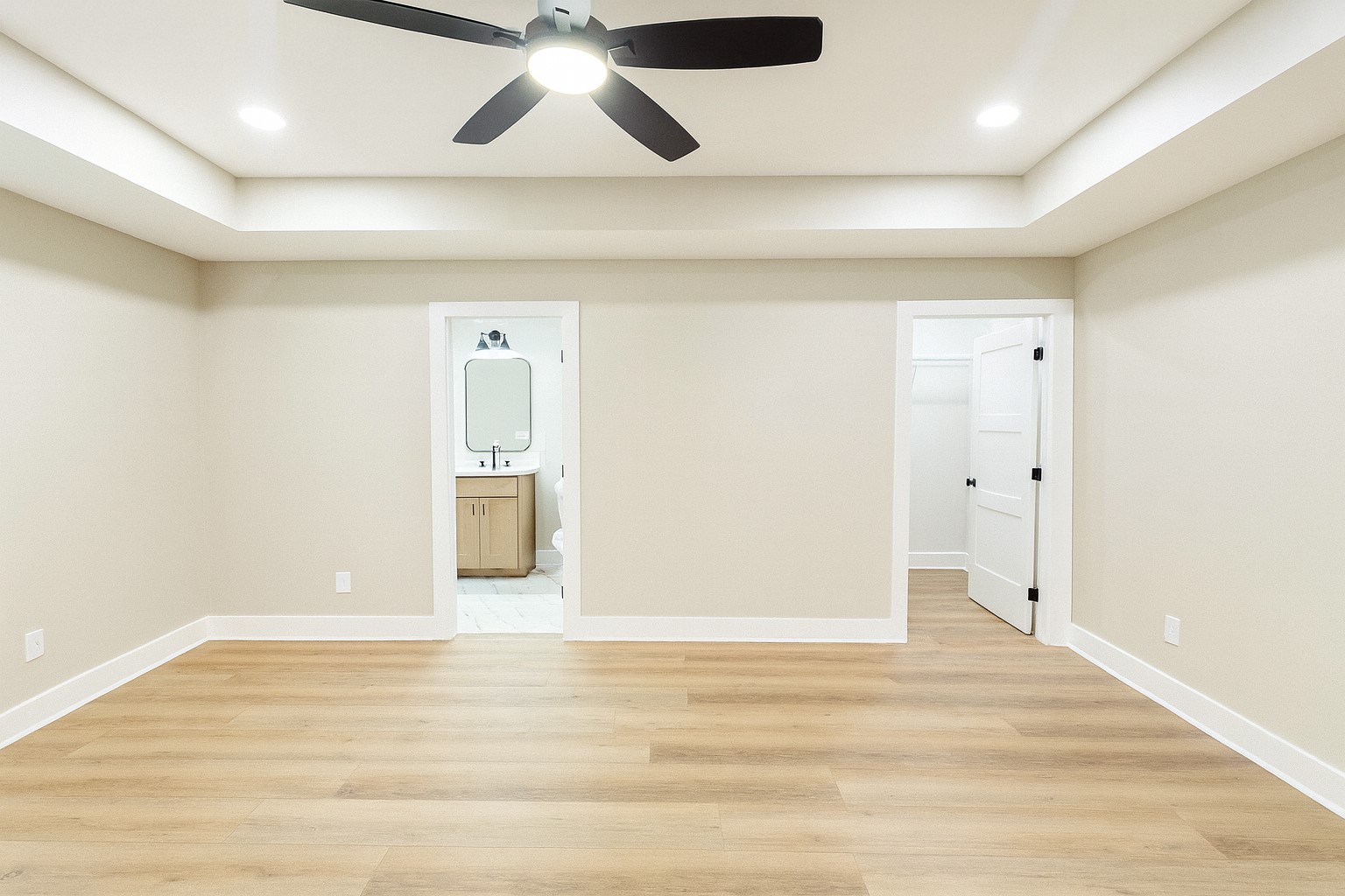 810 Lucas Road Dickson, TN 37055 - Photo 19 of 37 an empty room with wooden floor and windows