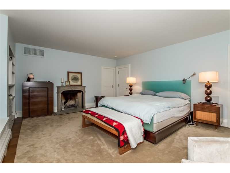 601 Beavertail Road Jamestown, RI 02835 - Photo 11 of 18 Master Bedroom. Serenity personified...cozy and inviting with wood burning fireplace