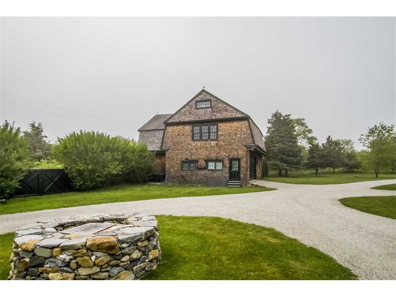 601 Beavertail Road Jamestown, RI 02835 - Photo 4 of 18 Stable/Barn. The restored well in the foreground catches rain water that is used to water the grounds.