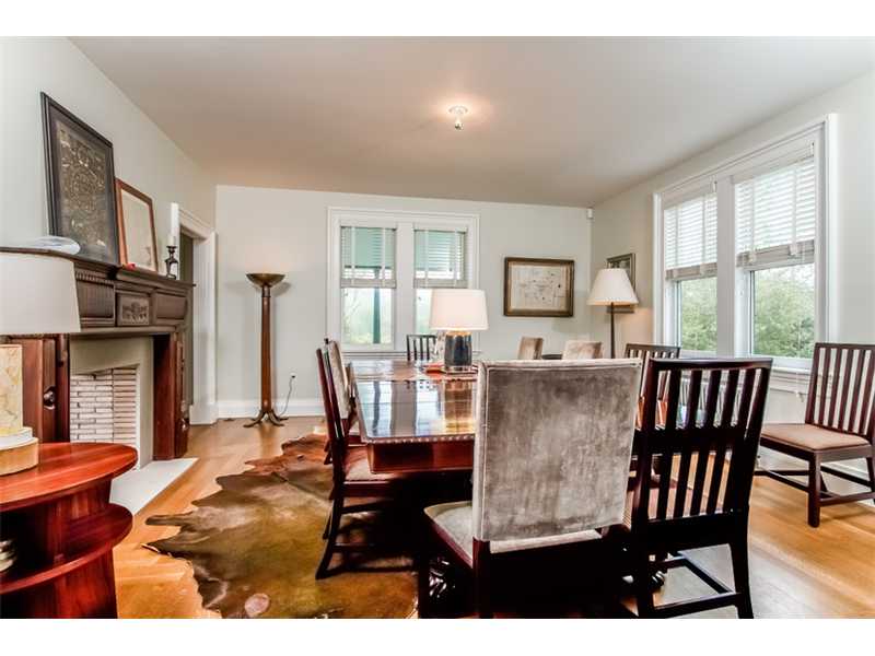 601 Beavertail Road Jamestown, RI 02835 - Photo 9 of 18 Dining Room. Formal dining room with double sided fireplace thru to living room