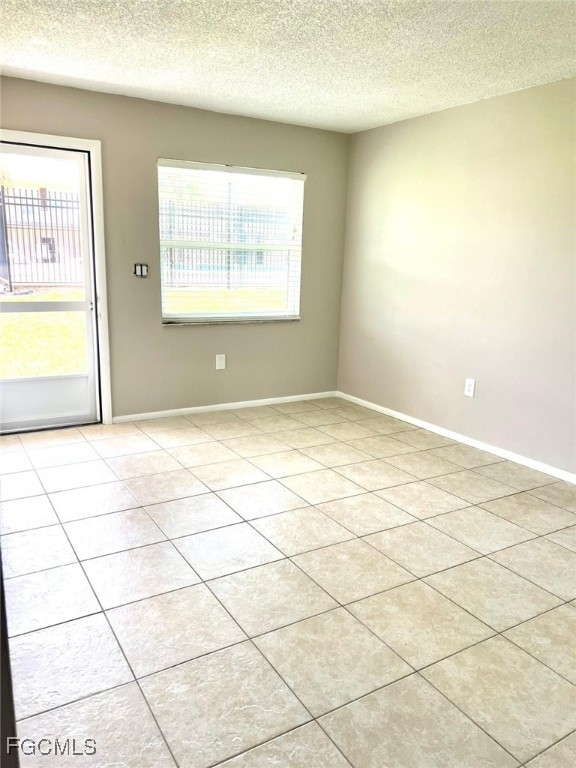 3325 Airport Road North, Unit L2 Naples, FL 34105 - Photo 14 of 14 a view of an empty room and a window