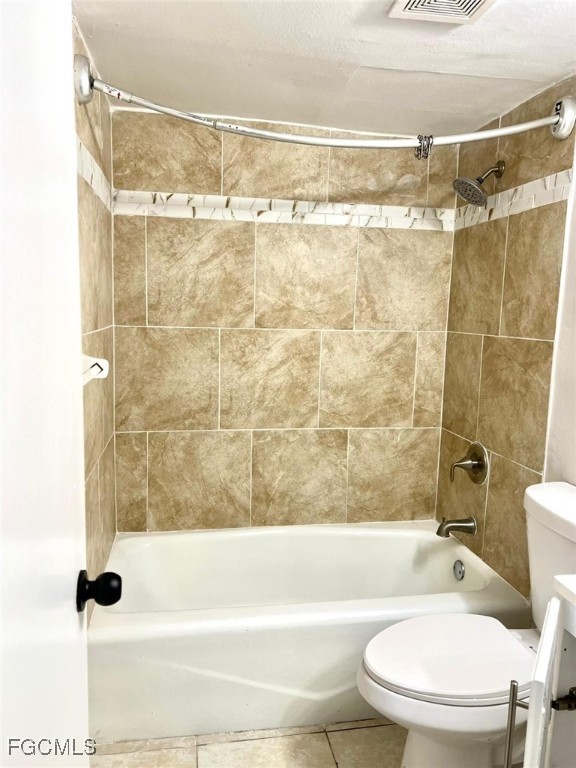 3325 Airport Road North, Unit L2 Naples, FL 34105 - Photo 6 of 14 a bathroom with a toilet and a shower