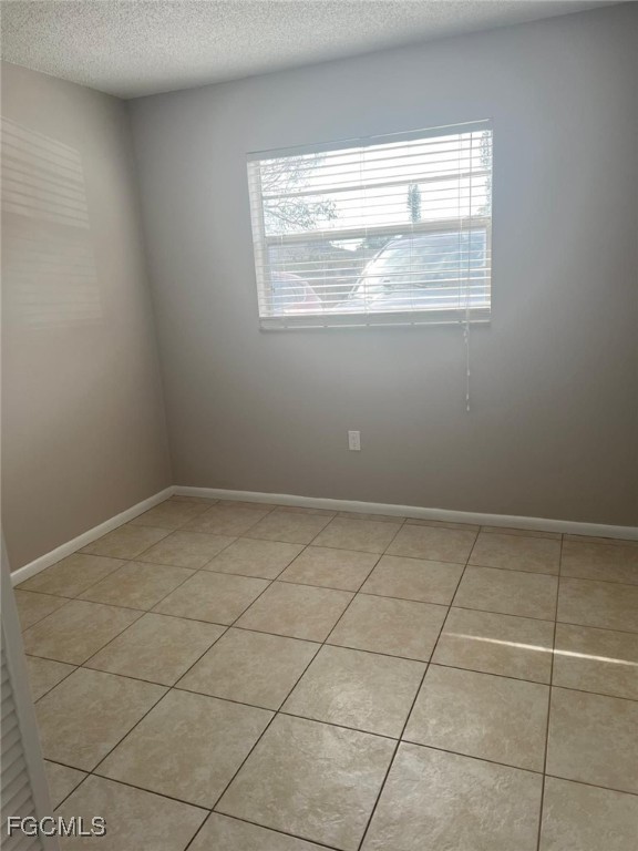 3325 Airport Road North, Unit L2 Naples, FL 34105 - Photo 9 of 14 a view of a room that has a window in it