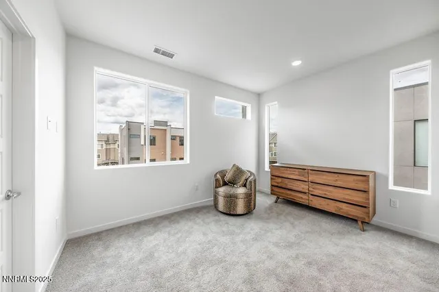 a room with toys and dresser